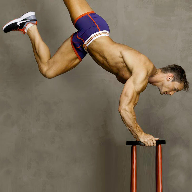 Fit Man Doing Handstand in Active Trunks Underwear